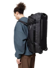 EASTPACK Duffel - حقيبة Duffel Pack Wheel M القماش المشمع سوداء